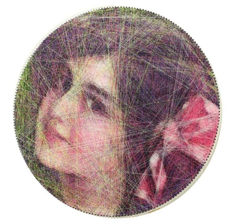 Retratos hechos con hilos